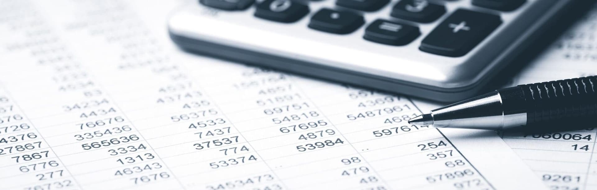 Financial documents and calculator on an office desk in Addis Ababa